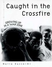 Book Cover for CAUGHT IN THE CROSSFIRE